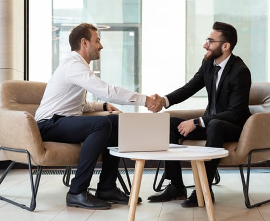 Businessmen shake hands